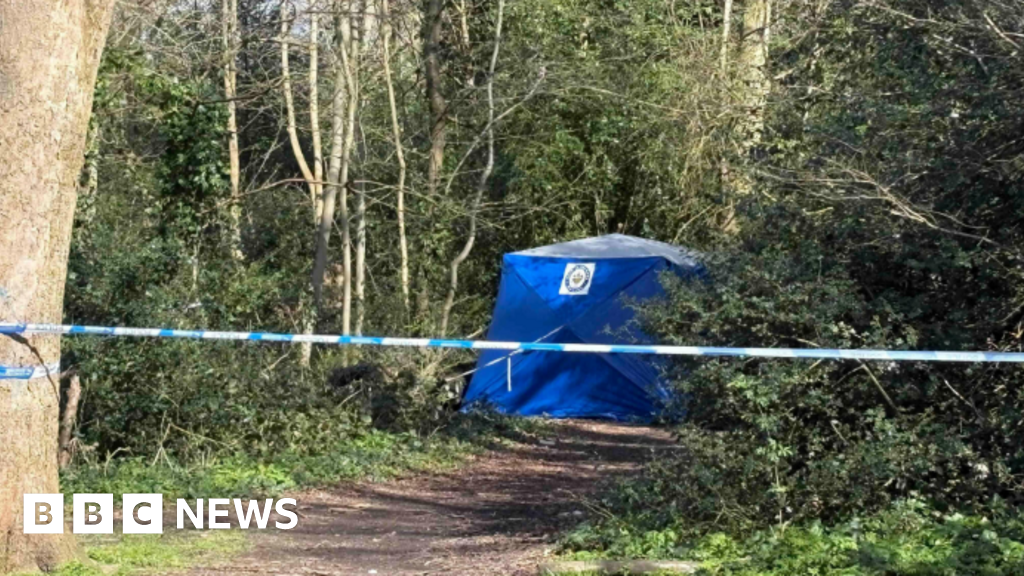 Three arrests after man found dead in wheelie bin